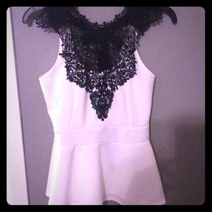 White and black size M peplum top